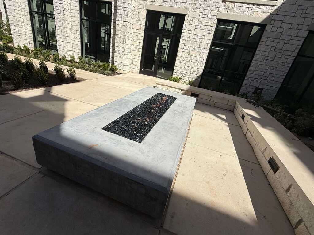 Custom concrete fire pit feature - LongHorn Landscape outdoor living